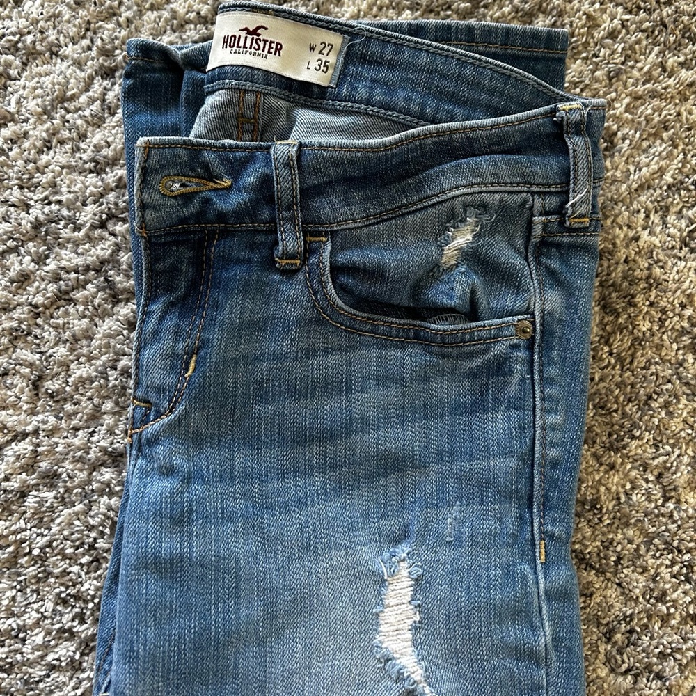 Hollister Blue Skinny Jeans with Distressing and Gold Stitching